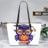 Cute owl with glasses and graduation hat holding books leather tote bag