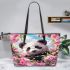 Cute panda surrounded among blooming cherry blossoms leather tote bag