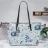 Cute pastel blue bunnies and floral pattern leather tote bag