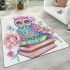 Cute pastel colorful owl sitting on top of books area rugs carpet