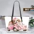 Cute pink car with a cute puppy wearing a bow on its head leather tote bag