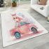 Cute pink owl sitting on top of a pastel car area rugs carpet