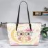 Cute pink owl with a bow and glasses sitting on the moon leather tote bag