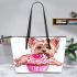 Cute pink yorkshire terrier in a cupcake leather tote bag