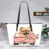 Cute pomeranian dog in a pink truck with flowers leather tote bag