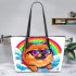 Cute pomeranian dog wearing black sunglasses leather tote bag