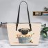 Cute pug dog inside a flower bucket leather tote bag