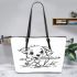 Cute puppy playing with a stick coloring page for kids leather tote bag