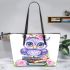 Cute purple owl sitting on top of books with pink roses leather tote bag