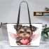 Cute valentine yorkie with angel wings holding a heart leather tote bag