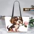 Cute valentine's day beagle puppy holding a pink rose leather tote bag