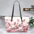 Cute white bunnies with pink flowers leather tote bag