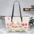 Cute white rabbit sitting on the swing leather tote bag