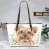 Cute yellow long haired smiling yorkshire terrier leather tote bag