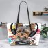 Cute yorkshire terrier dog wearing headphones leather tote bag