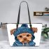 Cute yorkshire terrier in hoodie leather tote bag