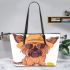 Cute yorkshire terrier wearing summer leather tote bag