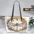 Dragonfly on clock face with roses leather tote bag