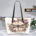 Dragonfly on clock face with roses leather tote bag