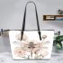 Dragonfly surrounded with peonies leather tote bag