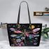 Dragonfly with flowers leather tote bag