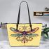 Dragonfly with swirls and filigree leather tote bag