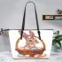 Easter bunny with a basket full of easter eggs leather tote bag