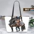 Elegant dark brown horse against a white background leather tote bag