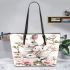 Family of three white rabbits with pink flowers leather tote bag