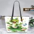 Frog sitting on a lily pad smiling with a butterfly and dragonfly leaather tote bag