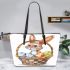 Happy easter bunny with colorful eggs in a basket isolated leather tote bag