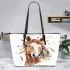 Indian horse with white feathers in its mane leather tote bag