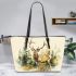 Majestic deer with impressive antlers standing in the forest leather totee bag