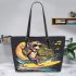 Monkey wearing sunglasses surfing with banana leather tote bag