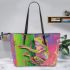 Pink and green tree frog on the edge leaather tote bag
