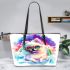 Pomeranian dog wearing sunglasses watching the rainbow leather tote bag