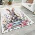 Rabbit sitting on top of books surrounded by flowers area rugs carpet