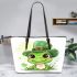 St patrick's day cute cartoon frog wearing leprechaun hat leaather tote bag