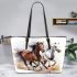 Three horses are galloping in the wind leather tote bag