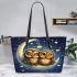 Two cute owls in love sitting on the crescent moon leather tote bag