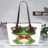 Vector cartoon of green frog wearing sunglasses and red bow tie leaather tote bag