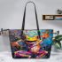 Vibrant painting of an happy dancing frog leaather tote bag