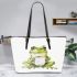 Watercolor cute and happy green frog sitting with coffee mug leaather tote bag