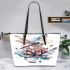 Watercolor dragonfly sitting on flower leather tote bag