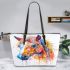 Watercolor painting of an abstract horse with colorful hair leather tote bag