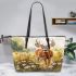 Whitetailed buck standing in meadow with daisies leather totee bag