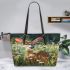 Whitetailed deer in the grass with daisies leather totee bag