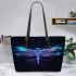 With a neon blue and purple dragonfly leather tote bag