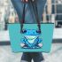 Adorable sitting blue tree frog wearing sneakers leaather tote bag