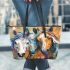 An acrylic painting of three horses close up leather tote bag